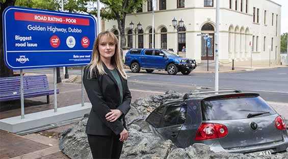 NRMA Spokesperson Katrina Usman stands in front of the demonstration they set up along Church Street. Picture by Belinda Soole