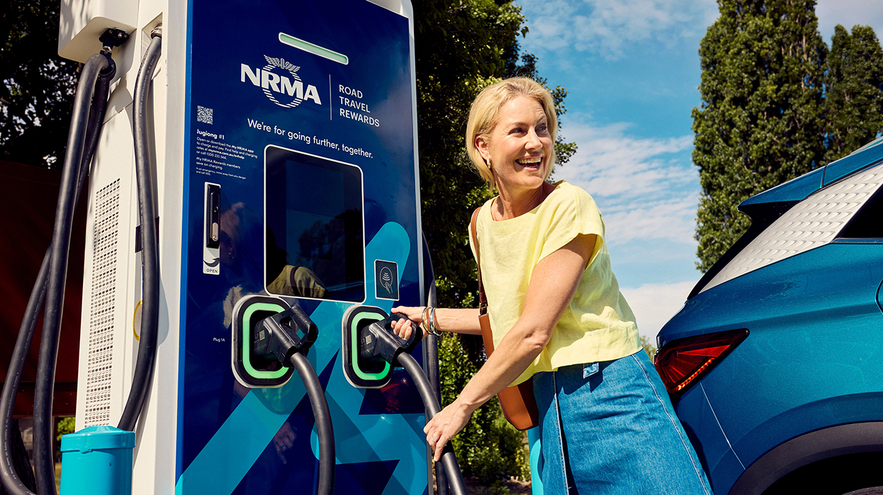 woman at nrma ev charging