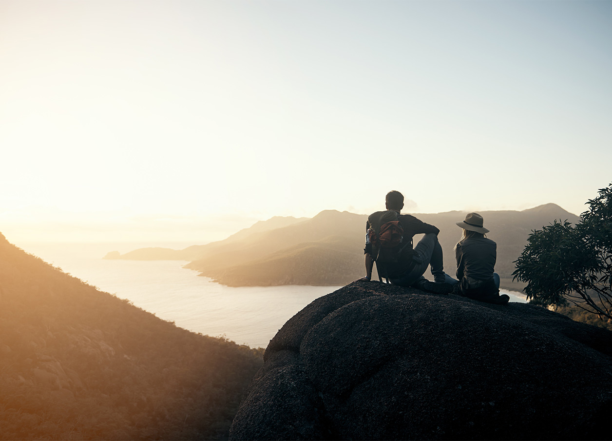 Young couple hiking in the mountains