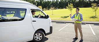 Corporate driver training man in van