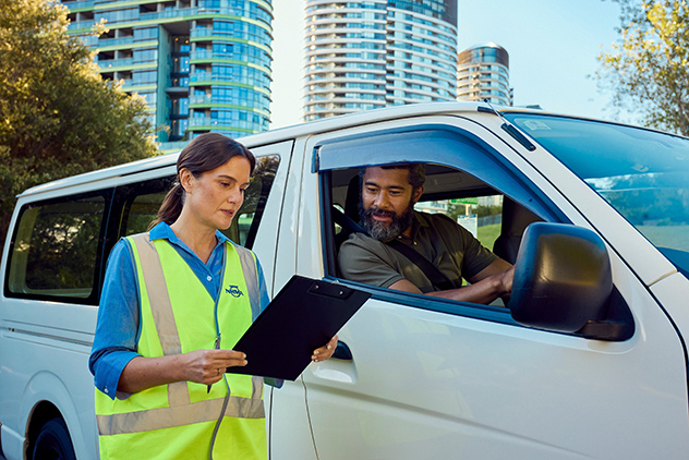 Corporate driving training instructor and customer