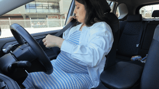 Buckling up a seatbelt while pregnant