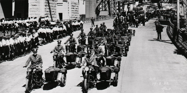 historic black and white image of nrma patrols in the opening procession for Sydney Harbour Bridge 1932