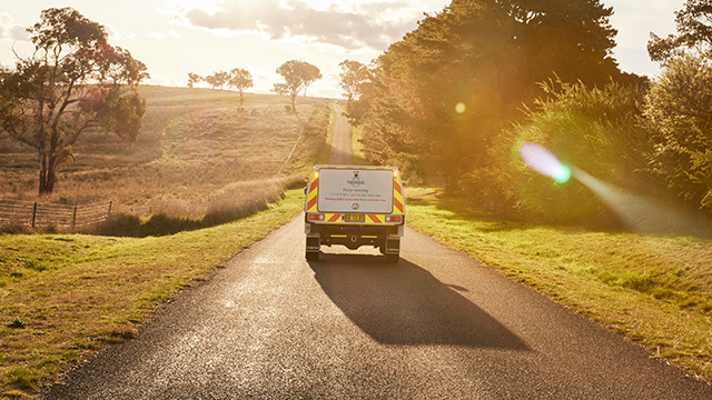 NRMA roadside assistance patrol van on a regional road