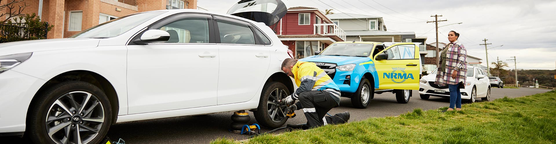 NRMA patrol changing a car tyre