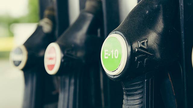 A row of petrol bowsers with e10 in focus