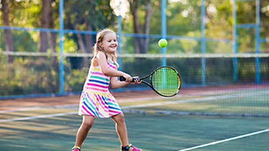 Girl playing tennis