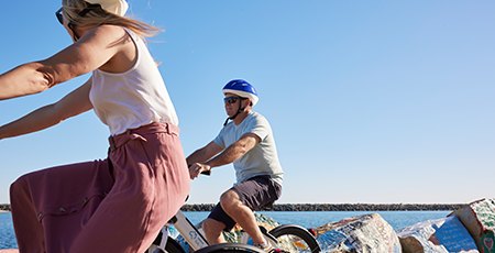 Couple hiring e-bikes