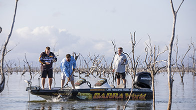 Men fishing from boat, credit: Tourism and Events Queensland