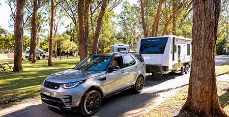 Car towing caravan