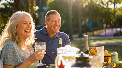Man and woman with drinks