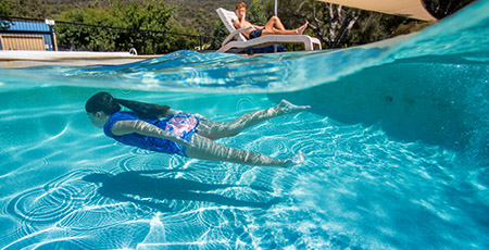 Girl swimming in pool
