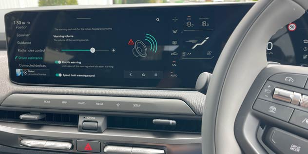 A car screen showing adas volume controls