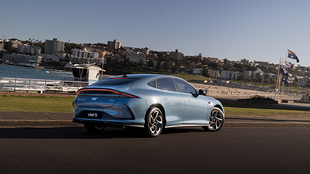 MG IM5 parked near a beach
