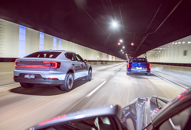 The Polestar 2, Kia EV4, and Tesla Model 3 in a tunnel