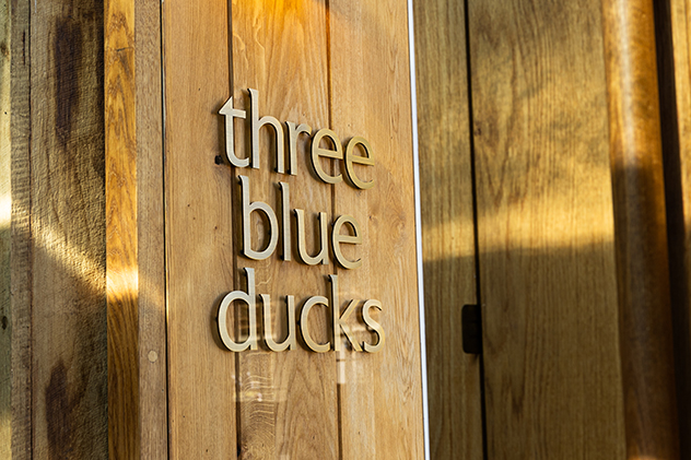 Three Blue Ducks restaurant sign