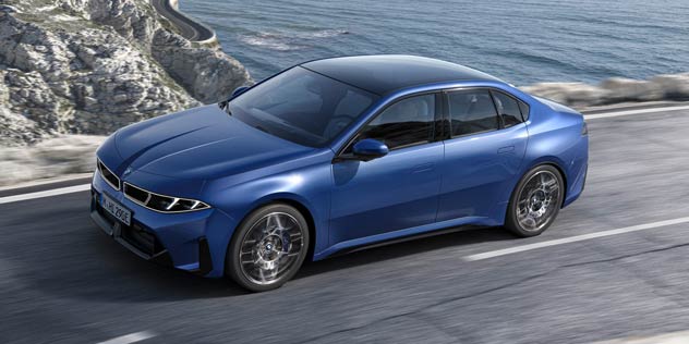 Blue BMW on coastal road