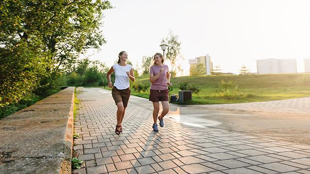 Two women running
