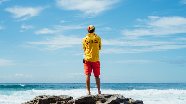 A lifesaver looking out to the ocean