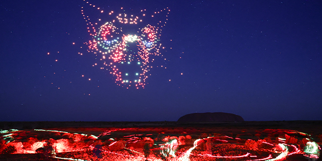 The Wintjiri Wiru drone and laser show lights up the night sky around Uluru, Northern Territory