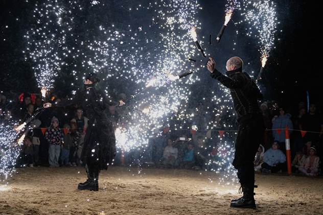 Two men performing at Frost and Fire