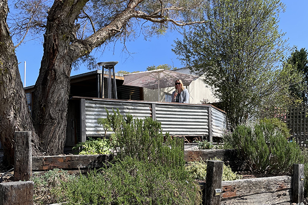 Woman drinking at North of Eden gin distillery