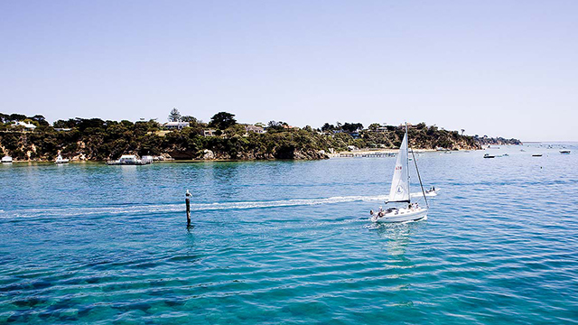 Sailboat in the waters off Portsea in Victoria