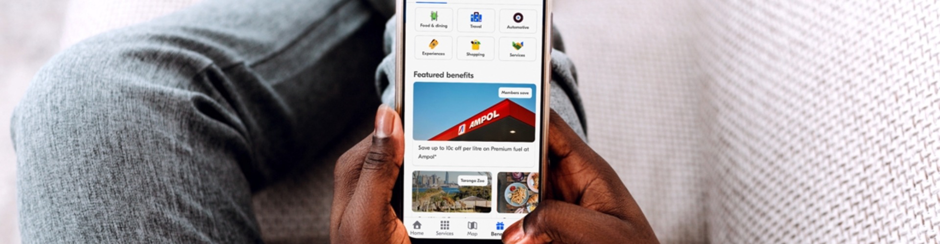 mynrma benefits screen mobile person looking at mynrma benefits on their mobile