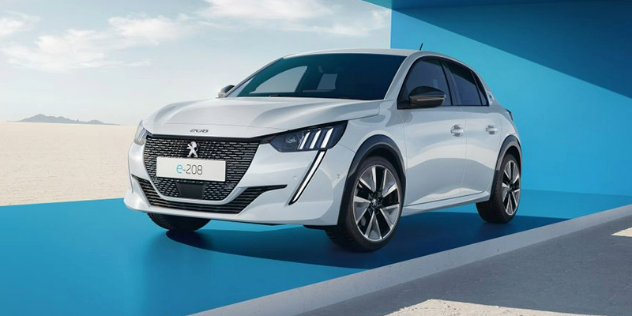 Side-angle view of a white Peugeot E 208 parked in a blue showroom strip with a large glass window on the other side of it.