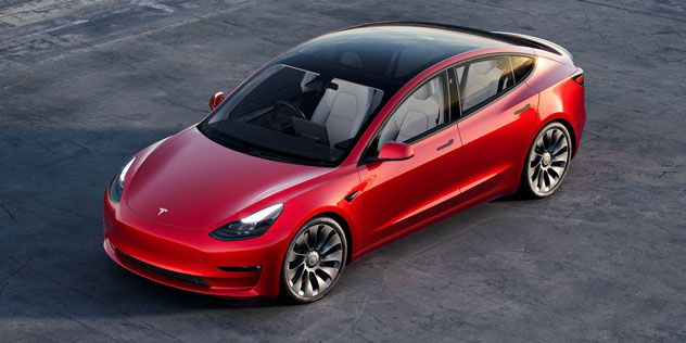 A red 2023 Tesla Model 3