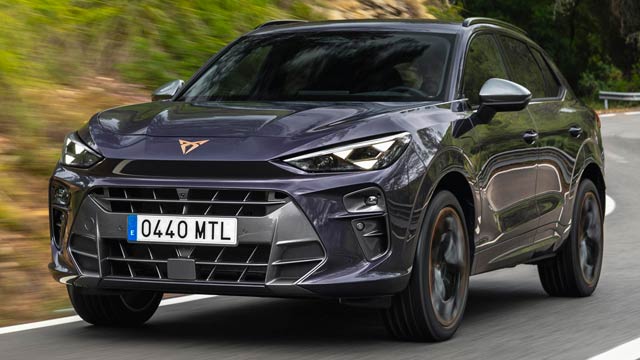 A Cupra Terramar SUV driving on a curved road