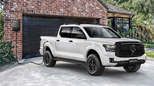 A white GWM Cannon Alpha plug-in hybrid parked in a driveway