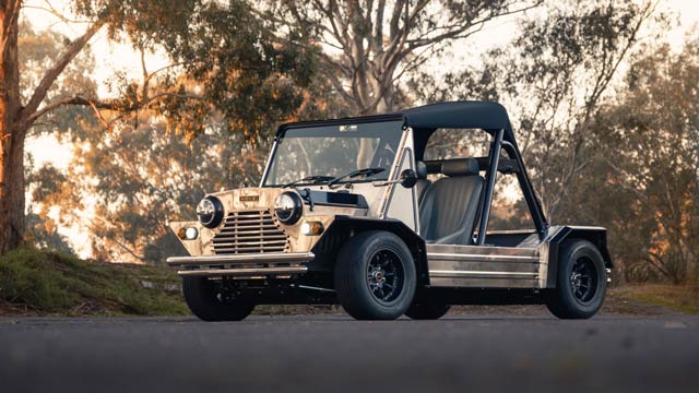 A silver mini moke in the afternoon sun