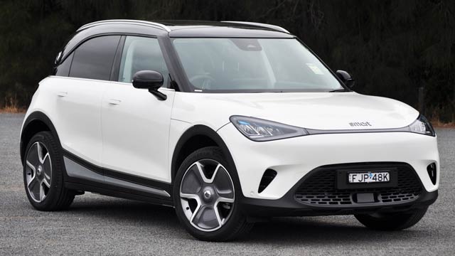 A white 2025 Smart #1 Pro electric car viewed from the front