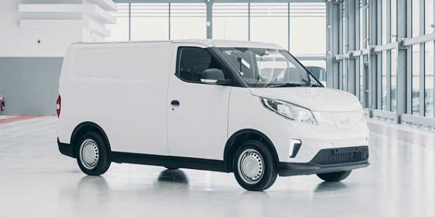 A white 2024 LDV eDeliver 7 sits alone in a modern showroom space