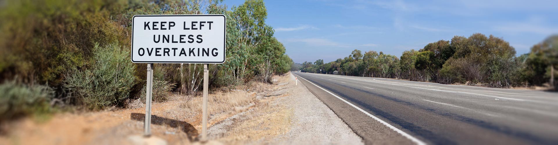 Keep left unless overtaking sign on the left of a country road