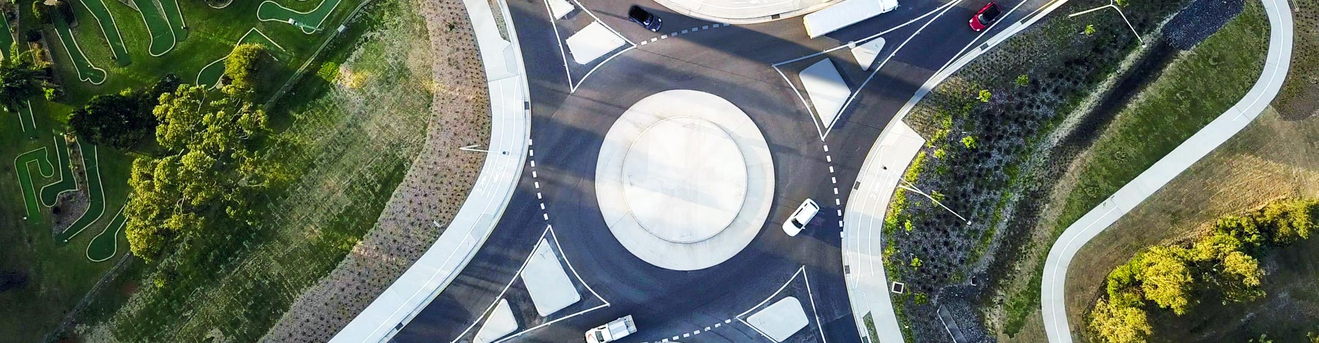 Aerial view of cars entering a roundabout