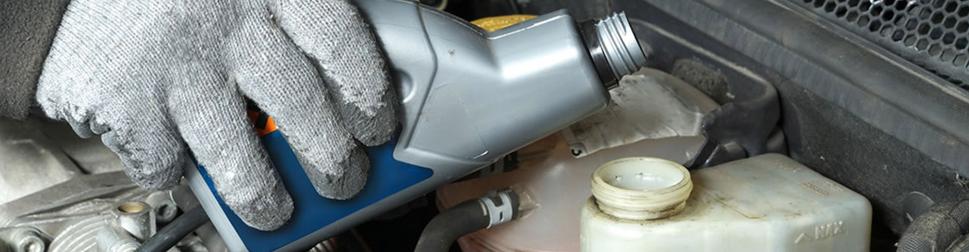 Topping up a car's brake fluid reservoir