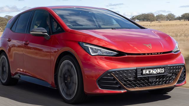 Red 2023 Cupra Born on country road