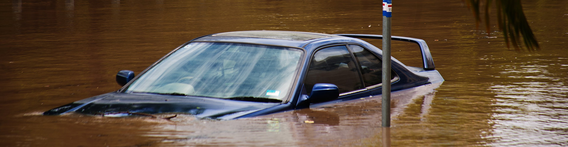 Car submerged in flood waters