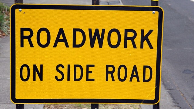 A yellow council roadworks sign