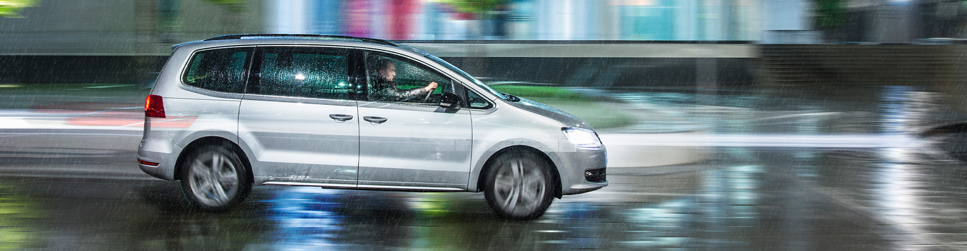 a car driving in rain