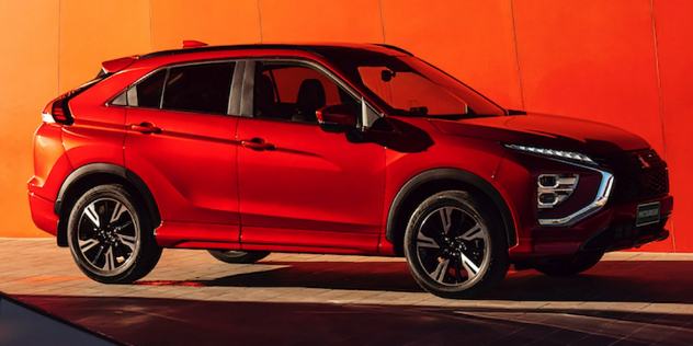 Side-angle view of a read Mitsubishi Eclipse Cross PHEV