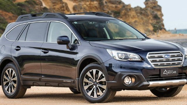 A family-sized Subaru SUV on a beach