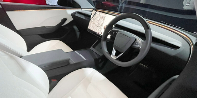 Front interior view inside the 2024 Tesla Model 3.