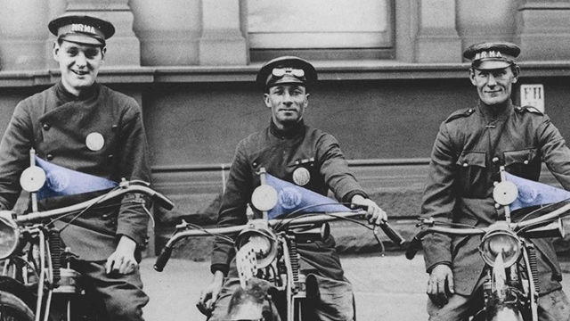 A black and white archival photograph of NRMA first patrols sitting on their motorcycles