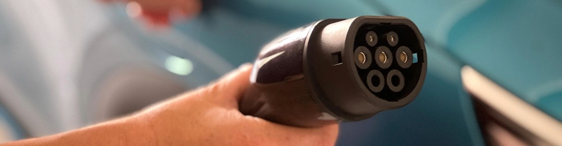 Close-up of an EV charging cable and plug