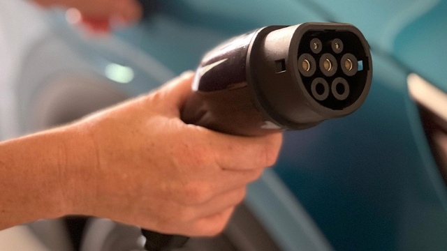 Close-up of an EV charging cable and plug