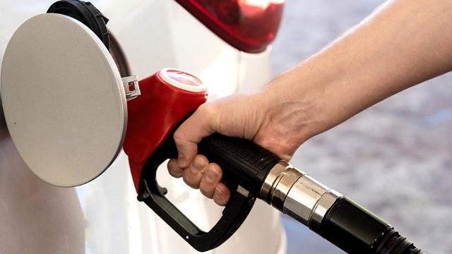 Someone filling their car with petrol