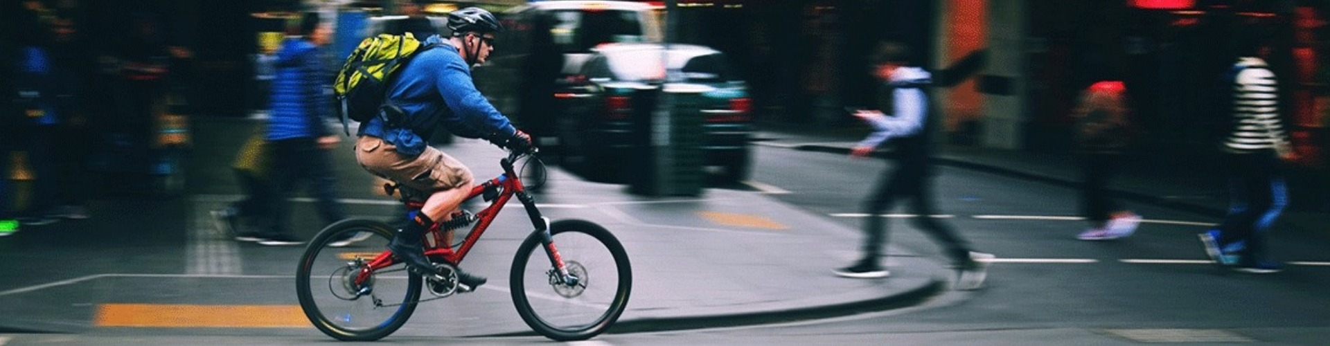 A bike rider on city streets